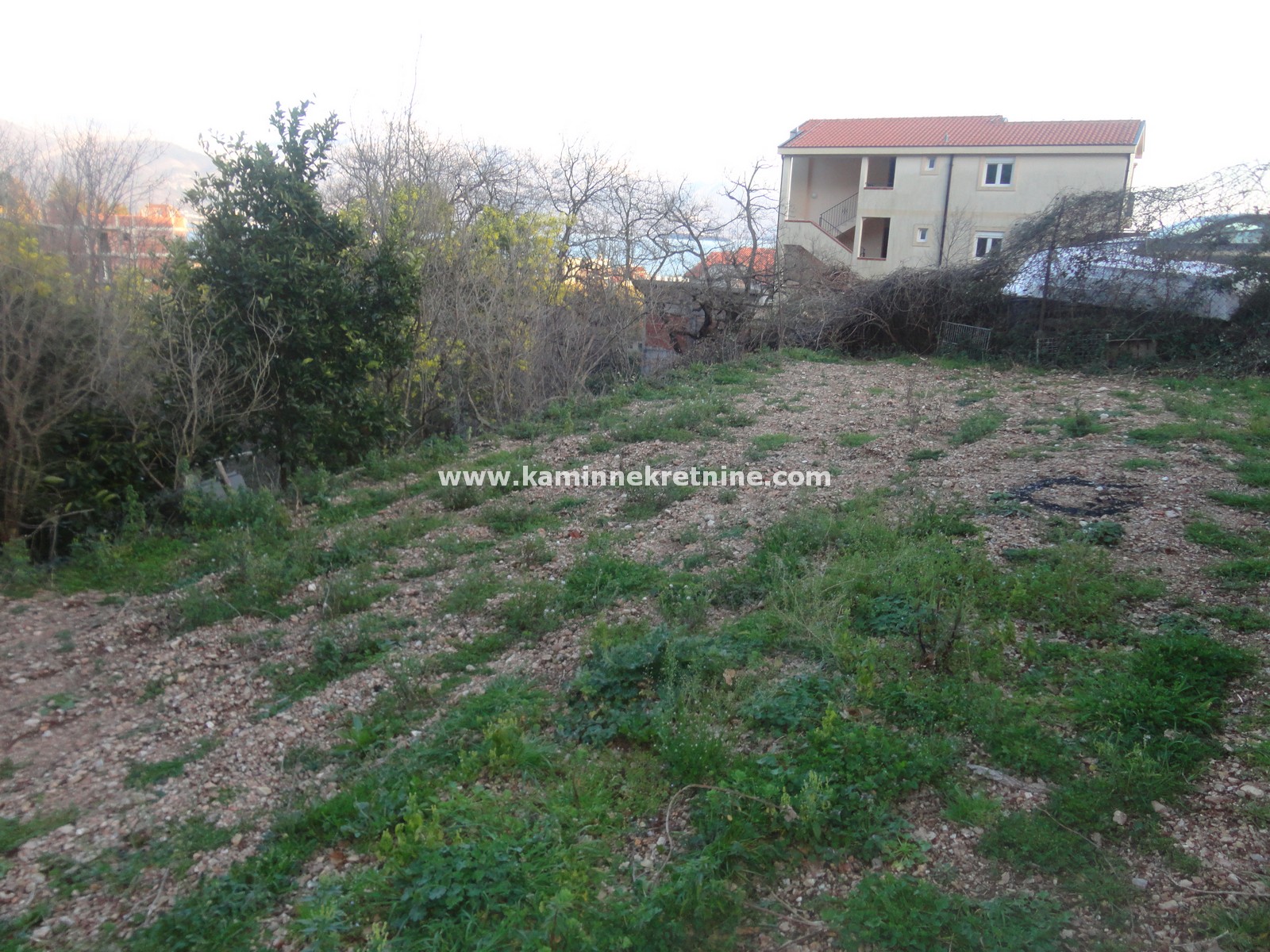 Neurbanizovan plac od 938 m² sa pogledom na more i Lovćen, Baošići, Herceg Novi