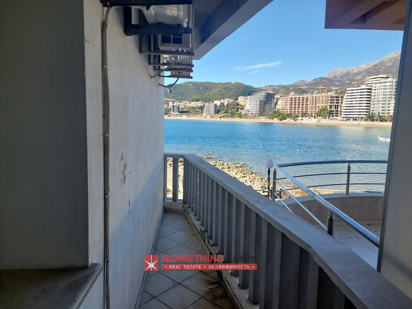 One-Bedroom Apartment on the Seafront with Side Sea View, Rafailovići, Budva